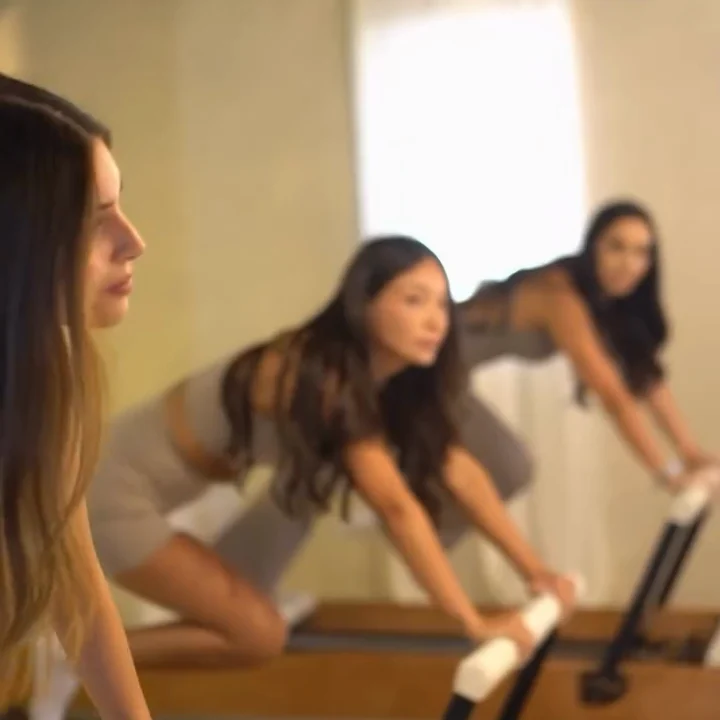 Clase grupal en reformer